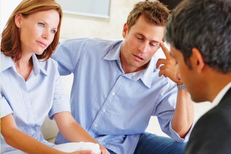 Parents consulting therapist.