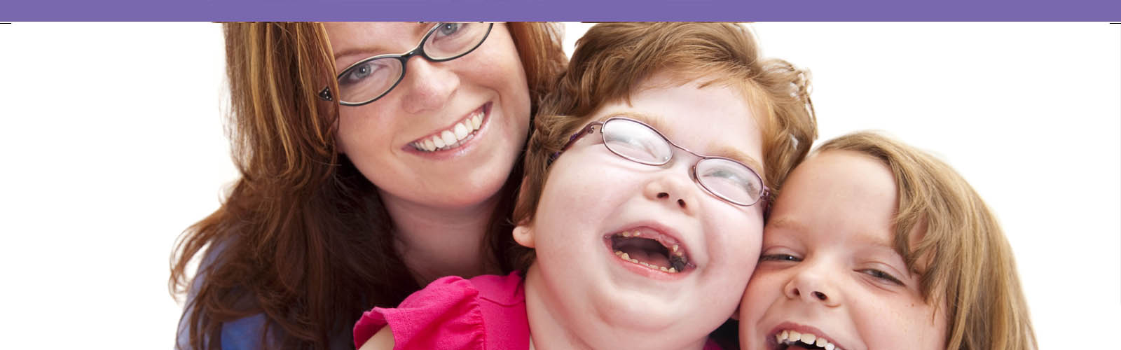 Mother laughing with her two children.